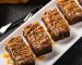 Pecan pie brownie bars drizzled with caramel sauce